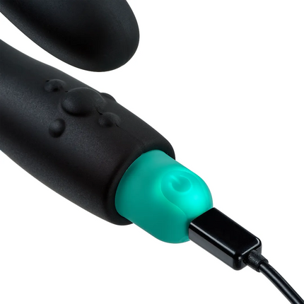 Estimulador de próstata con base basculante y vibrador tipo bala recargable